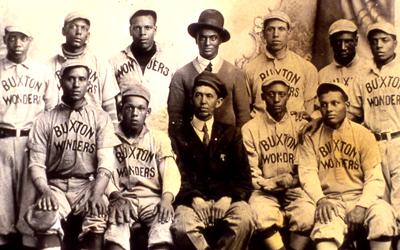 Photograph of the Buxton Wonders Baseball Team, an all-Negro traveling baseball team in 1915.