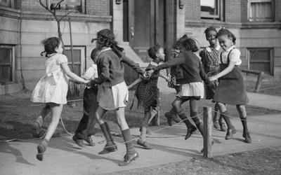 Children Play "Ring Around the Rosie" in Chicago, Illinois