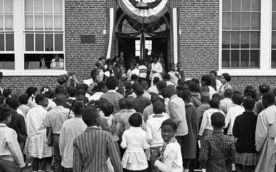 African American school children entering the Mary E. Branch School at S. Main Street and Griffin Boulevard, Farmville, Prince Edward County, Virginia