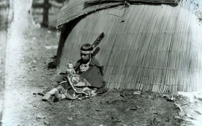 Meskwaki Girl and Her Doll, 1925