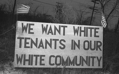 A protest sign placed outside a housing project for African Americans in Detroit, Michigan.  Detroit was one of many northern cities African Americans migrated to from the South during the Great Migration. 