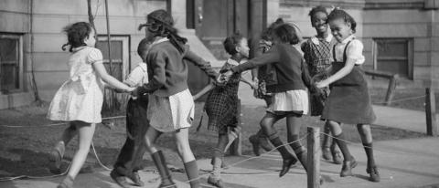 Children Play "Ring Around the Rosie" in Chicago, Illinois