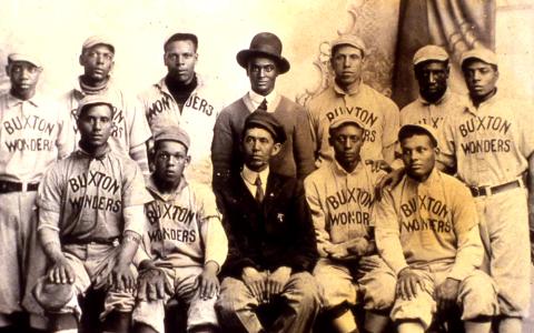 Photograph of the Buxton Wonders Baseball Team, an all-Negro traveling baseball team in 1915.