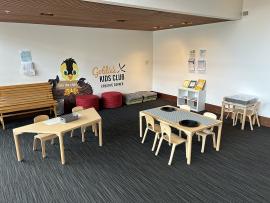 Link to a high resolution image of the Goldie’s Kids Club Creative Corner on the second floor with a variety of seating options