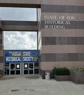 Link to a high resolution image of the exterior view of the State Historical Museum of Iowa entrance on Grand Avenue
