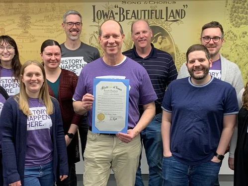 Iowa history month 2024 staff standing together and smiling