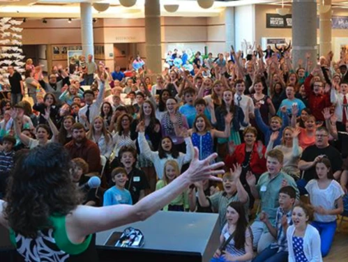 A group of students gather for a National History Day kickoff