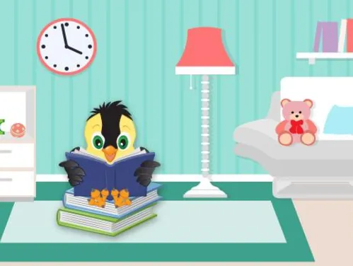 Goldie sitting on a couple books, reading a book