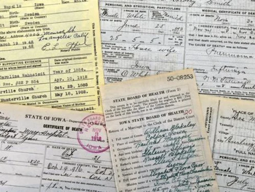 Lots of forms, one is an Certificate of Death