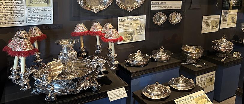 Centerpiece and other pieces of the silver service on display in the USS Iowa Silver Service exhibit
