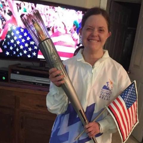 Mia Peterson with Olympic Torch