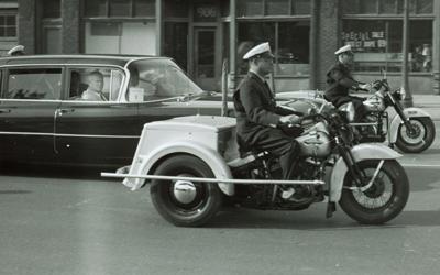 Russian Premiere Nikita Khrushchev is seen in this photo in a motorcade traveling down Keosauqua Way en route to a reception at Hotel Ft. Des Moines.