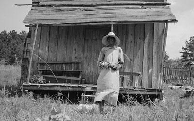 Sharecropper's Wife and Cabin near Jackson, Mississippi, June 1937
