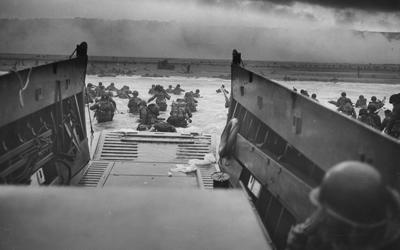 This photograph from the Franklin D. Roosevelt Library in Hyde Park, New York, shows American soldiers landing in Normandy, France, on the morning of June 6, 1944, the beginning of the long-awaited invasion to liberate continental Europe from the grip of Nazi Germany