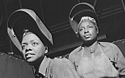 Two African-American women welders.