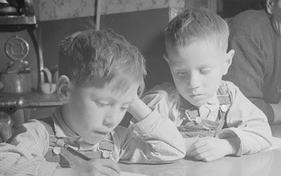 Lopez Children Doing Their Homework in Trampas, New Mexico, January 1943
