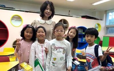 First graders with their teacher in South Korea.