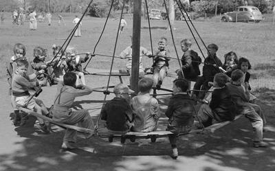 Students swinging on a playground in Texas 1939.