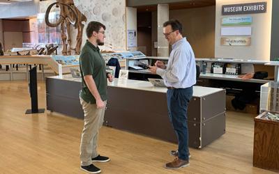 Receptionist Helping a Guest at the State Historical Museum, 2019