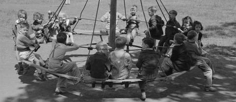 Schoolchildren on Circular Swing in San Augustine, Texas, April 1939