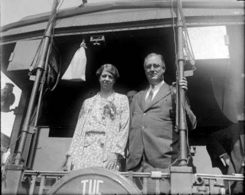 President Franklin Delano Roosevelt and his wife Eleanor Roosevelt pose on a train probably near Denver, Colorado.