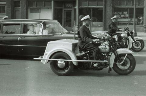 Russian Premiere Nikita Khrushchev is seen in this photo in a motorcade traveling down Keosauqua Way en route to a reception at Hotel Ft. Des Moines.