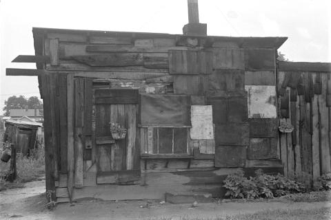The image of a decrepit shack that was one of many in "Hoovervilles" across American during the Great Depression. 