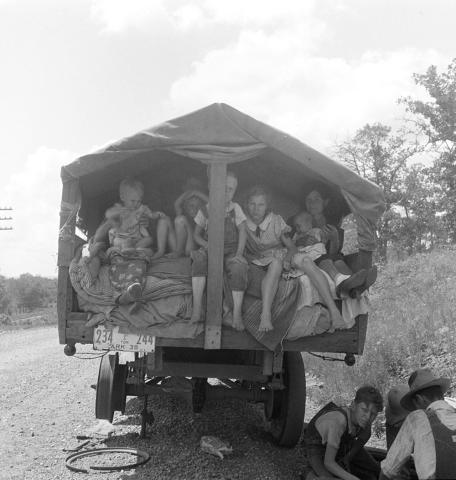 This image shows a family that was from Arkansas traveling during the dust bowl era.  The title indicates they anticipate ending up in California one day - as many families did.