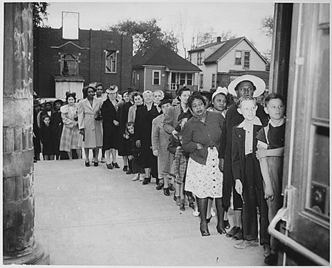  A long line of women waiting for sugar rations.