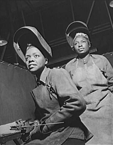 Two African-American women welders.