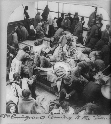 Emigrants huddled together on their journey to America in 1902 by William H. Rau.