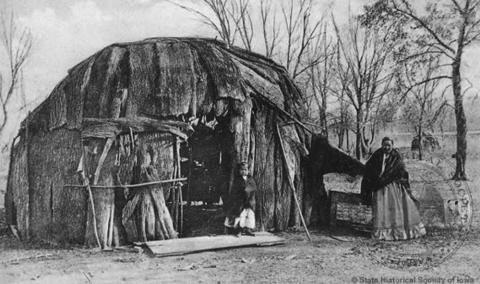 Meskwaki Woman and Child by a Wickiup in Tama, Iowa, Date Unknown 
