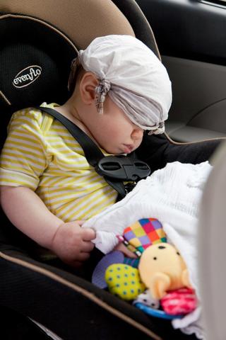 Infant Asleep in a Car Seat, Date Unknown 