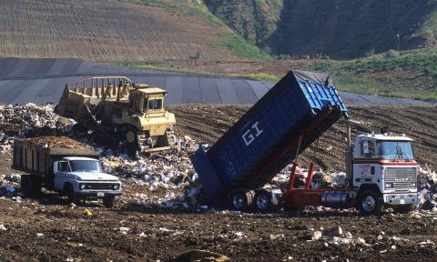Truck Dumping Trash at a Landfill, Date Unknown