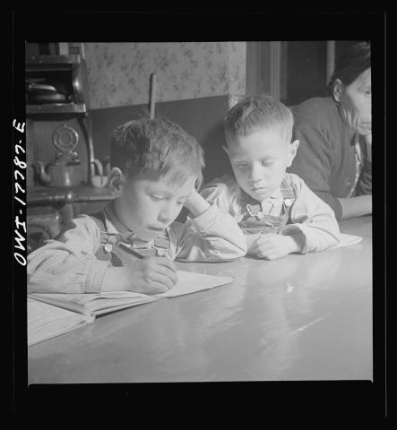 Lopez Children Doing Their Homework in Trampas, New Mexico, January 1943