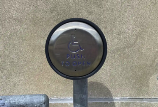 Automatic door button at the Centennial Building entrance