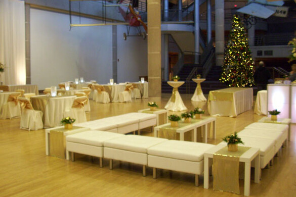 State Historical Building atrium set up for a high-end event with a Christmas tree and lounge area