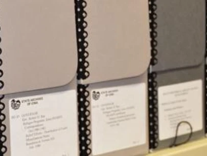 Shelf view of document boxes in State Archives of Iowa